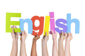 「English」の文字を持つたくさんの腕